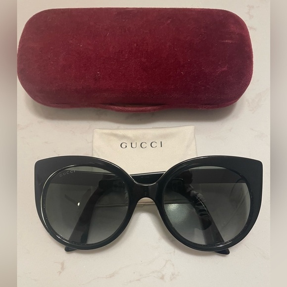 Gucci Accessories - Gucci Cat Eye Black Sunglasses with golden logo temples and a logo on a lense